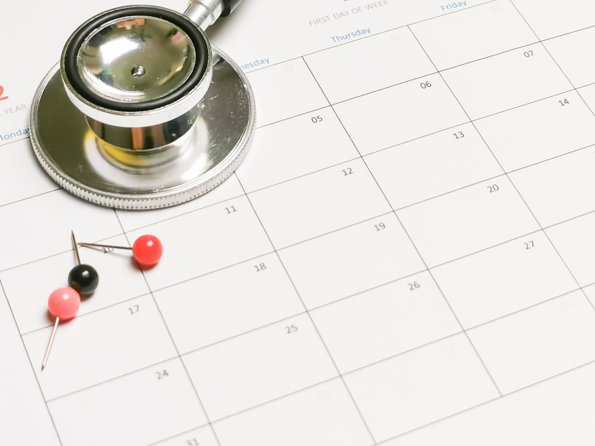 Stethoscope On Blank Calender With Thumbtack